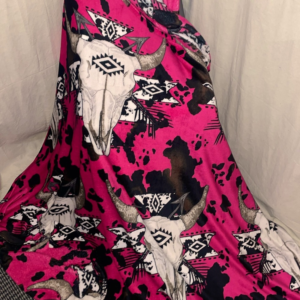Fuchsia plush cow skull blanket